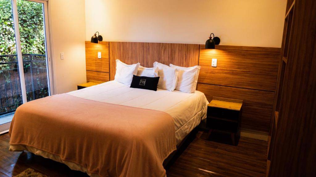 Quarto Deluxe do Ti Voglio Bene Boutique hotel em Campos do Jordão - Just Real Moms